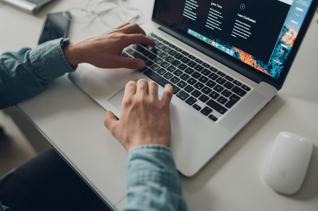 person learning python on laptop
