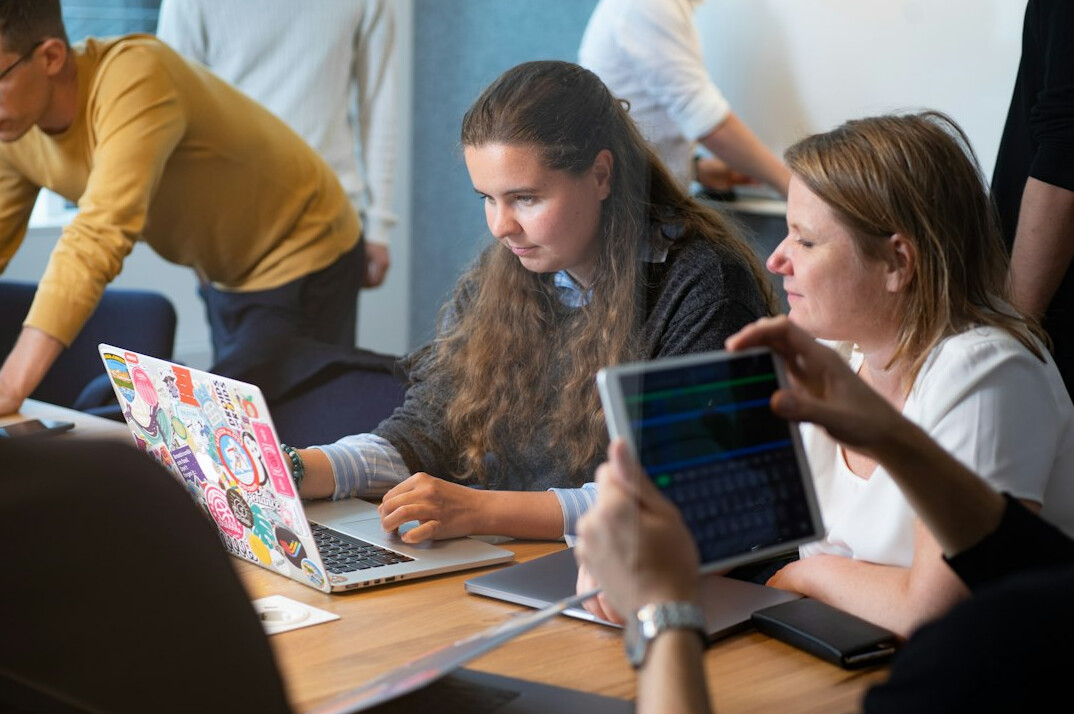 group of friends discussing code