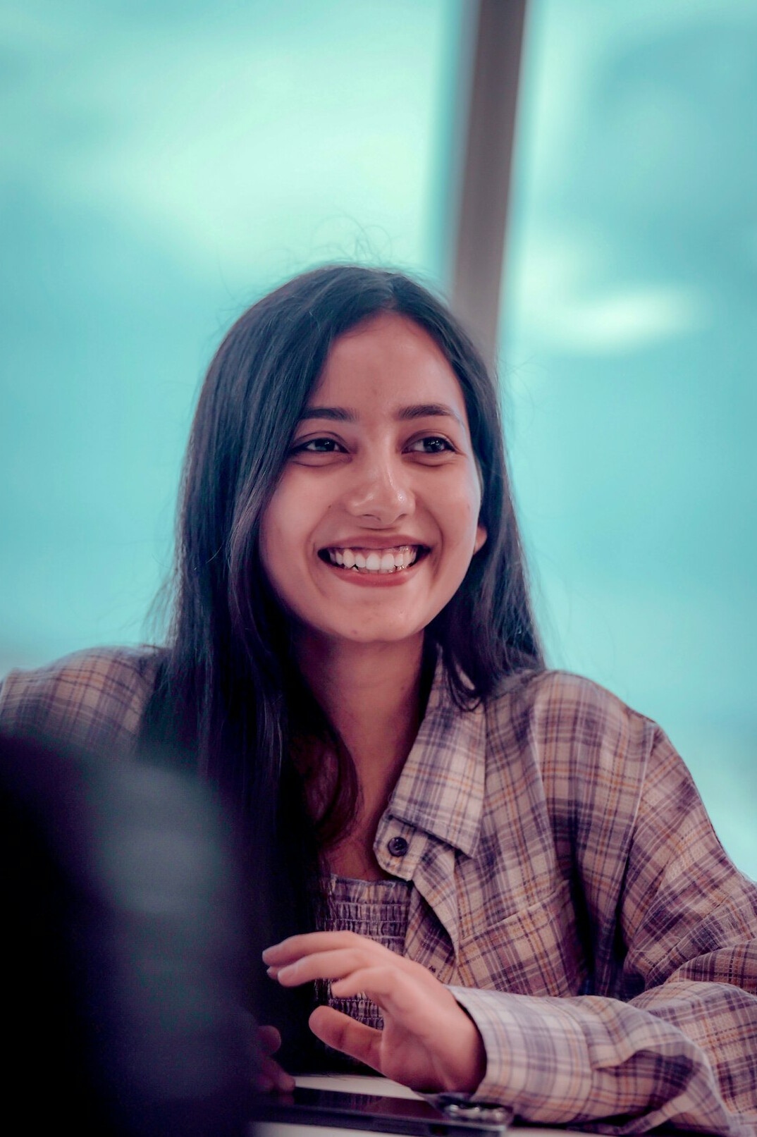 person smiling while coding